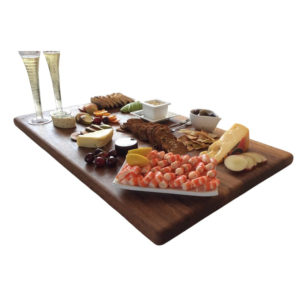 Extra Large size chef series wooden chopping board displayed in use as a platter