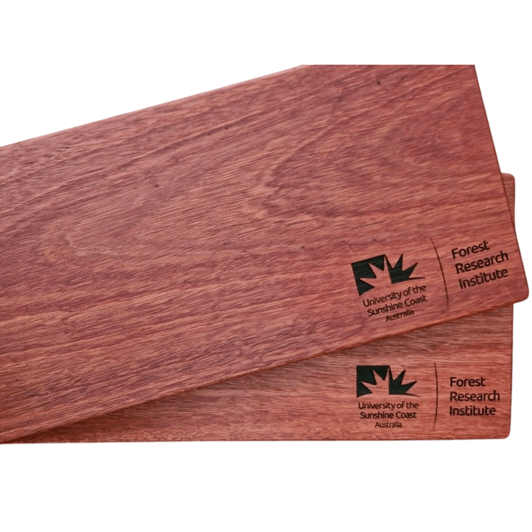 Logo engraved boards in red coloured timber, custom made for the University of The Sunshine Coast Australia