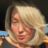 Testimonial profile photo of a blonde female head shot