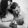 Testimonal profile photo of a man and his child in black and white